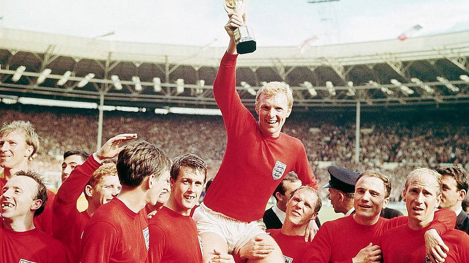 Bobby Moore holding World Cup trophy