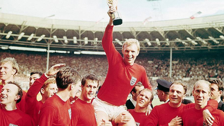 Bobby Moore holding World Cup trophy