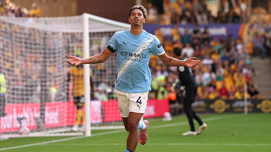 Tijjani Reijnders celebrating for Man City.