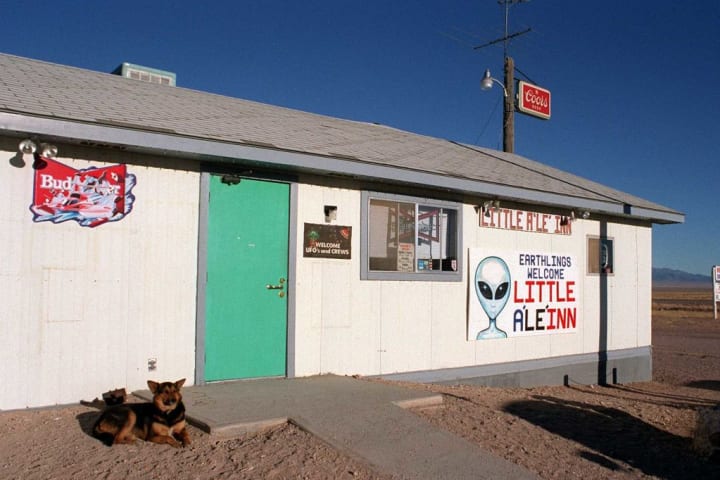 A bar in the Nevada desert with an Area 51 alien sign