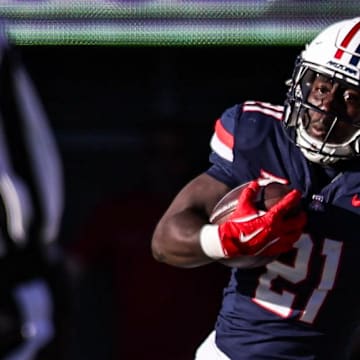 Nov 8, 2025; Tucson, Arizona, USA; Arizona Wildcats running back Ismail Mahdi (21) runs with the ball during the third quarter of the game against the Kansas Jayhawks at Arizona Stadium. Mandatory Credit: Aryanna Frank-Imagn Images