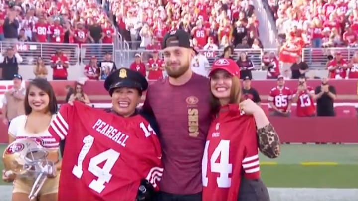 Pearsall poses with Sgt. Joelle Harrell and Dr. Lucy Kornblith ahead of the game against the New York Jets at Levi's Stadium.