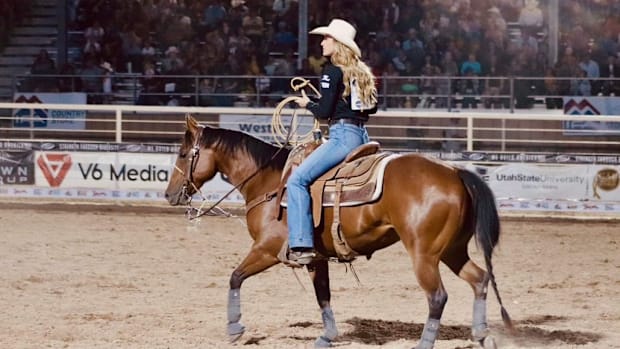 Kinlie Brennise walking out of the arena horseback after her run