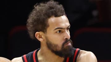 Trae Young #11 of the Atlanta Hawks looks to pass against the Miami Heat.