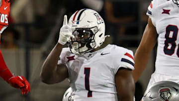 Aug 31, 2024; Tucson, Arizona, USA;  Arizona Wildcats running back Jacory Croskey-Merritt (1) celebrates first down during first quarter at Arizona Stadium. Mandatory Credit: Aryanna Frank-Imagn Images