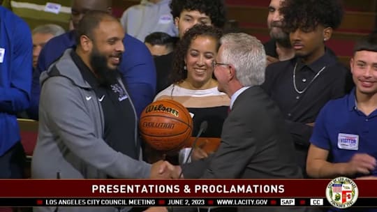 Grant High boys basketball coach Tarek Abdelsameia (left) acknowledged at Los Angeles City Hall after winning a City title in 2023.