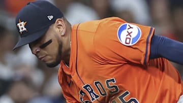 Houston Astros third baseman Isaac Paredes (15) is unable to make a play on a ground ball during the fifth inning against the Texas Rangers at Daikin Park.