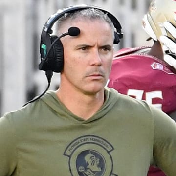 Nov 2, 2024; Tallahassee, Florida, USA; Florida State Seminoles head coach Mike Norvell looks on from the sideline after the North Carolina Tarheels score a final touchdown in the fourth quarter at Doak S. Campbell Stadium. Mandatory Credit: Robert Myers-Imagn Images