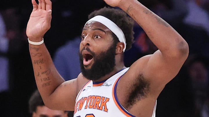 Feb 4, 2026; New York, New York, USA;  New York Knicks center Mitchell Robinson (23) reacts after getting called for a foul in the second overtime against the Denver Nuggets at Madison Square Garden. Mandatory Credit: Wendell Cruz-Imagn Images