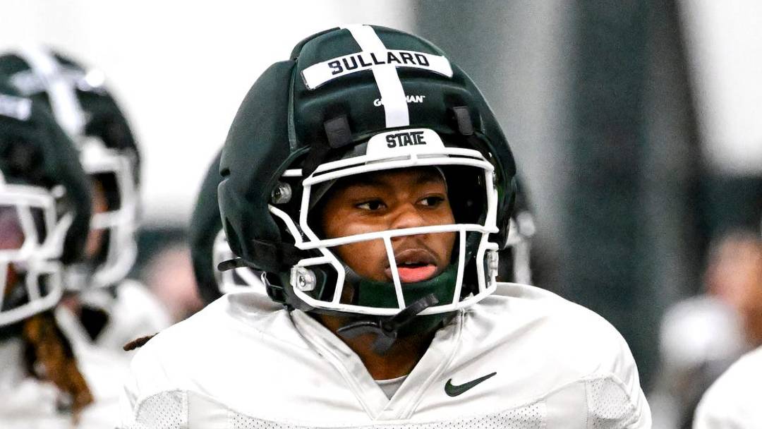 Michigan State's Rodney Bullard Jr. carries the ball while moving to the next drill during spring football practice on Tuesday, April 14, 2026, in East Lansing.