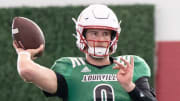 Louisville football quarterback Tyler Shough (9) runs drills during spring practice on Saturday, March 23, 2024 at the Trager practice facility in Louisville, Ky.