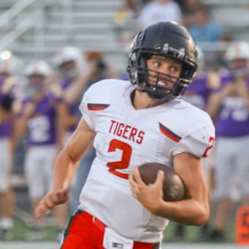 ADM's Hudson Shull runs in for his second touchdown of the night after reversing field during a scrimmage against Johnston on Friday, Aug. 23, 2024.