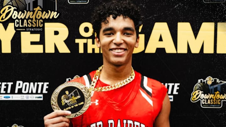 Isaiah Spencer of Lowville capped an amazing 32-point performance with a buzzer beating 3-pointer to lift his team to an 82-80 win over Potsdam on Friday night in the Downtown Classic iin Utica, New York.