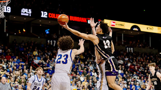 Quincy Scott and Columbia of Burbank finally hauled in elusive Class 2B championship this winter, defeating Freeman in the fi