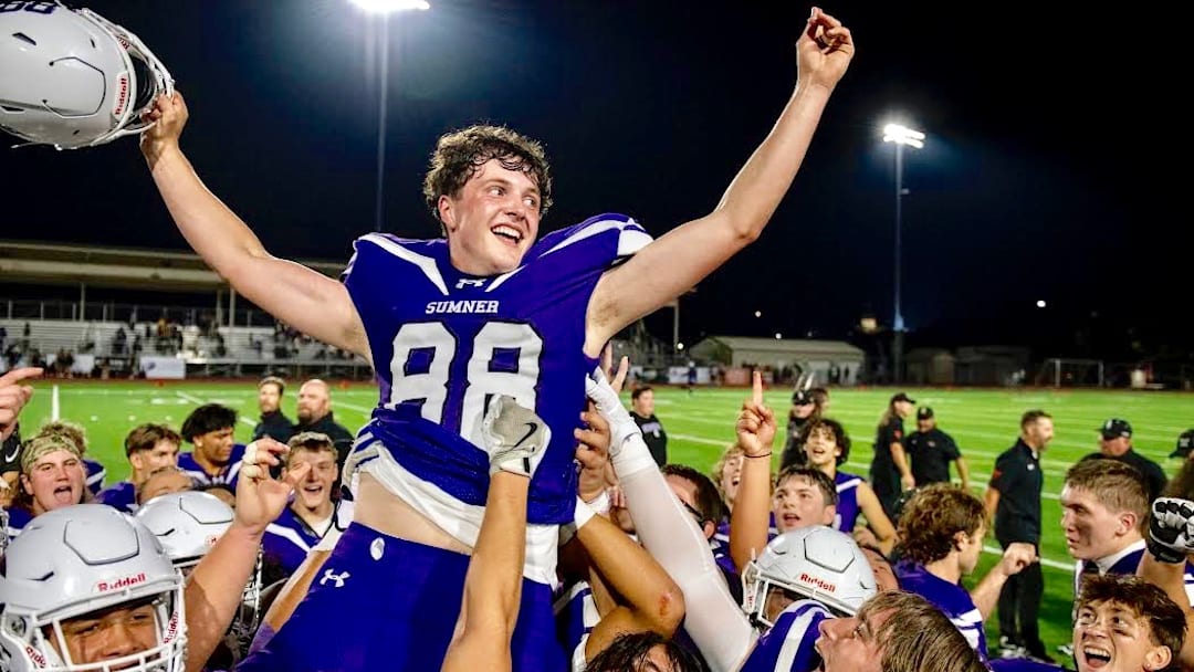 Sumner kicker Austin Ferencz is carried off the field after booting the game winning field goal in overtime in Spartans' wild win over Lake Stevens.