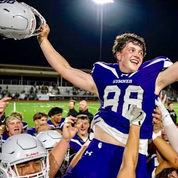 Sumner kicker Austin Ferencz is carried off the field after booting the game winning field goal in overtime in Spartans' wild win over Lake Stevens.