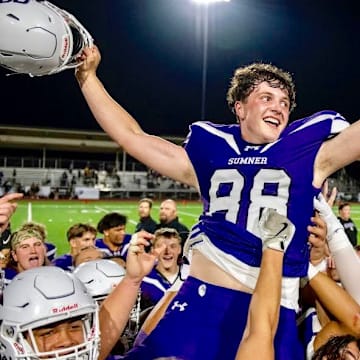 Sumner kicker Austin Ferencz is carried off the field after booting the game winning field goal in overtime in Spartans' wild win over Lake Stevens.