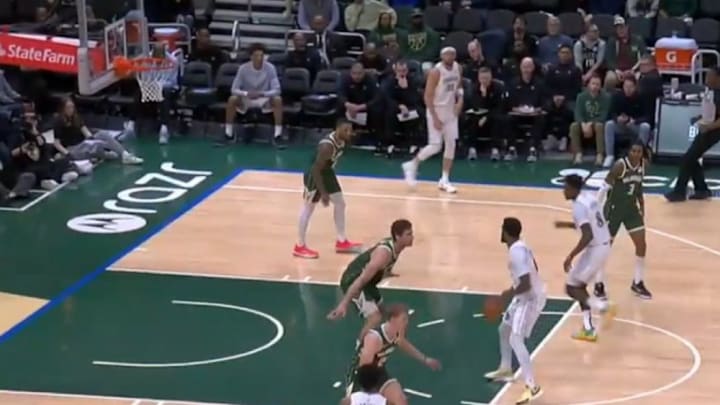Empty Mavs bench against Milwaukee
