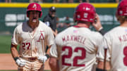 Ryder Helfrick celebrates after hitting a grand slam against the Tennessee Volunteers in the rubber game and series finale. The Razorbacks won 8-4. 