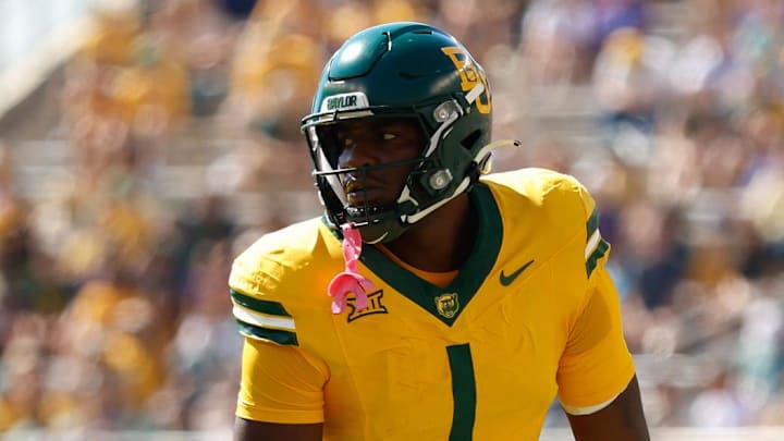 Oct 4, 2025; Waco, Texas, USA; Baylor Bears tight end Michael Trigg (1) lines up against Kansas State Wildcats safety Logan Bartley (10) during the first half at McLane Stadium. Mandatory Credit: Chris Jones-Imagn Images