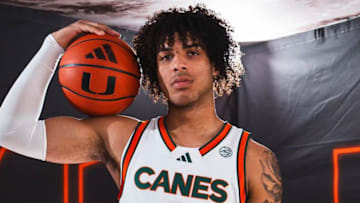  Isaiah Johnson-Arigu posing at media day for Miami Hurricanes Men's Basketball