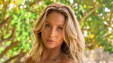 Alix Earle was photographed by Yu Tsai in Jamaica. Swimsuit by Indah. Body chain by Jacquie Aiche.