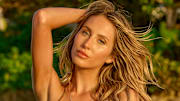 Alix Earle was photographed by Yu Tsai in Jamaica. Swimsuit by Lybethras. Body Chain by Jacquie Aiche.