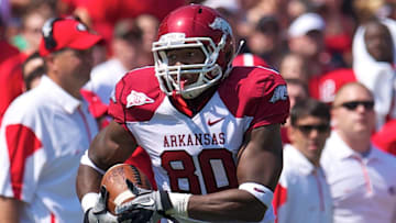 September 18, 2010; Athens, GA, USA; Arkansas Razorbacks tight end Chris Gragg (80) runs with the ball against the Georgia Bulldogs in the first half at Sanford Stadium. Arkansas defeated Georgia 31-24. Mandatory Credit: Dale Zanine-Imagn Images