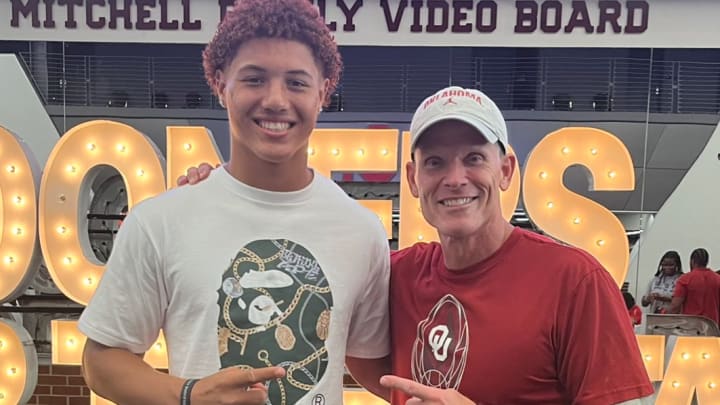 Denton Guyer 2027 ATH Zane Rowe with Oklahoma head coach Brent Venables