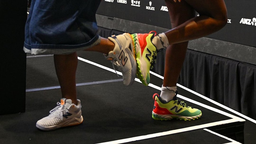 Francisco Lindor and Coco Gauff swap New Balance shoes at the Australian Open.