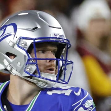 Seattle Seahawks quarterback Sam Darnold throws the ball against the Washington Commanders.