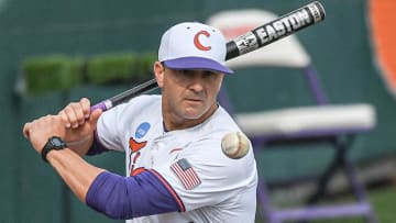 Jun 2, 2024; Clemson, South Carolina, USA; Clemson Head Coach Erik Bakich hits to infielders before the game with Clemson and Coastal Carolina University the NCAA baseball Clemson Regional at Doug Kingsmore Stadium in Clemson. 