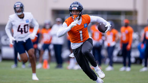 Denver Broncos tight end Evan Engram (1) runs a route during an OTA practice at Broncos Park Powered by CommonSpirit.