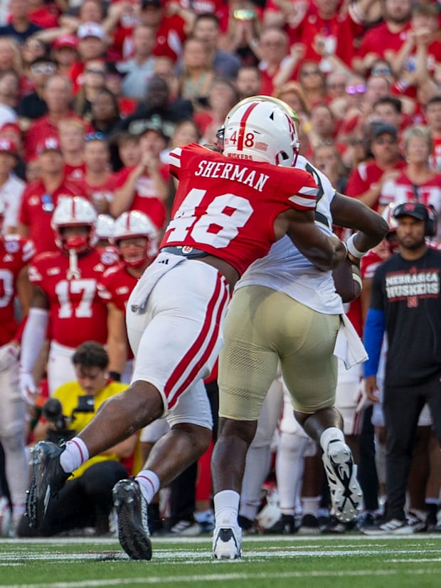 Nebraska linebacker MJ Sherman sacks Colorado quarterback Shedeur Sanders for a 5-yard loss.