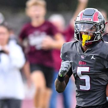 Westside High senior Armoni Weaver (5) returns the opening kickoff 87 yards for a touchdown against Belton-Honea Path High during the first quarter at Westside High in Anderson, S.C. Friday, September 13, 2024.