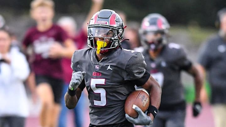 Westside High senior Armoni Weaver (5) returns the opening kickoff 87 yards for a touchdown against Belton-Honea Path High during the first quarter at Westside High in Anderson, S.C. Friday, September 13, 2024.