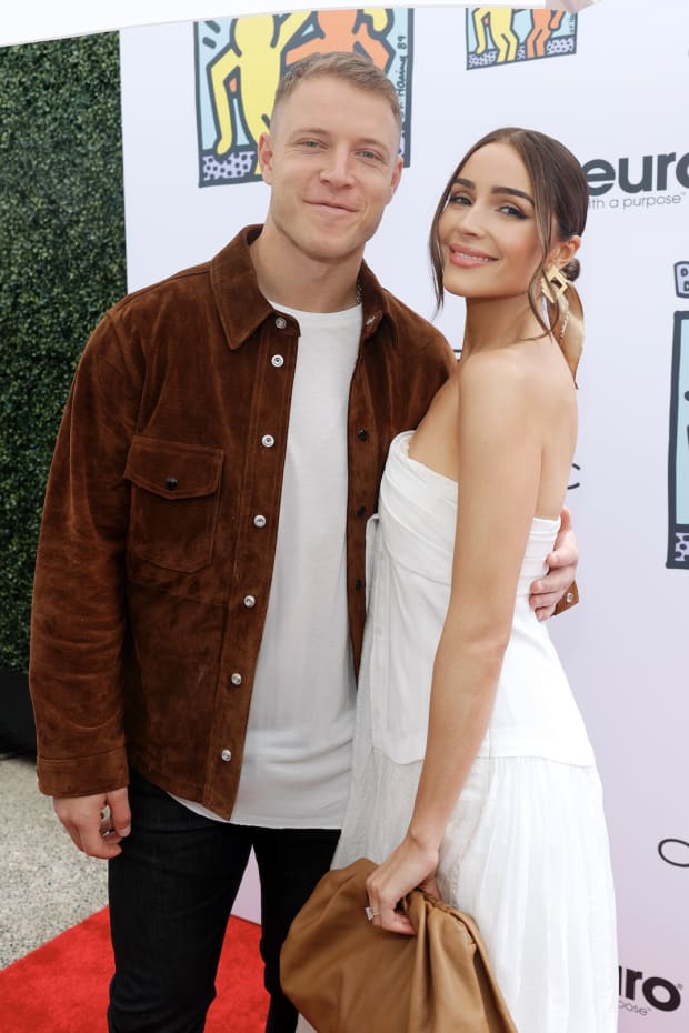 Christian McCaffrey and Olivia Culpo