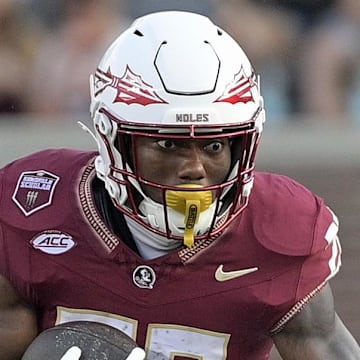 Sep 20, 2025; Tallahassee, Florida, USA; Florida State Seminoles running back Samuel Singleton Jr. (28) runs the ball during the second half against the Kent State Golden Flashes at Doak S. Campbell Stadium. Mandatory Credit: Melina Myers-Imagn Images
