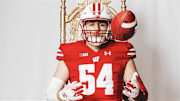 Arlington (MA) HS offensive lineman Brady Bekkenhuis poses on his official visit to Wisconsin.