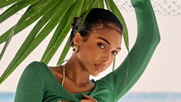 Lori Harvey was photographed by Yu Tsai in Mexico. Top by Calle Del Mar. Earrings by Ben-Amun by Isaac Manevitz.