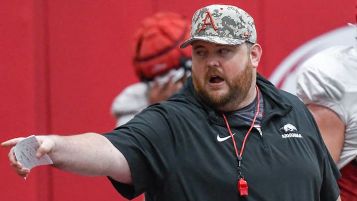 Arkansas Razorbacks offensive line coach Eric Mateos during a spring practice on the indoor field at Fayetteville, Ark.