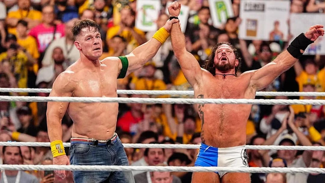 John Cena raises AJ Styles hand after their match at Crown Jewel in Perth, Australia