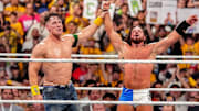 John Cena raises AJ Styles hand after their match at Crown Jewel in Perth, Australia