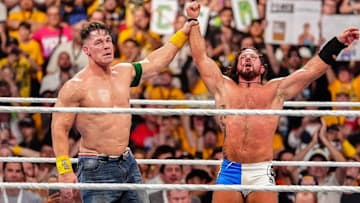 John Cena raises AJ Styles hand after their match at Crown Jewel in Perth, Australia