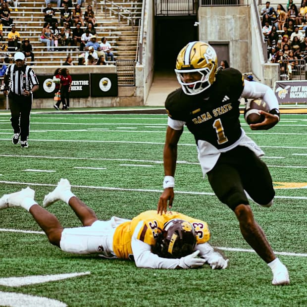 Andrew Body, QB of the Alabama State Hornets evades a Bethune-Cookman defender in Week 6. Andrew Body, QB of the Alabama State Hornets evades a Bethune-Cookman defender in Week 6.