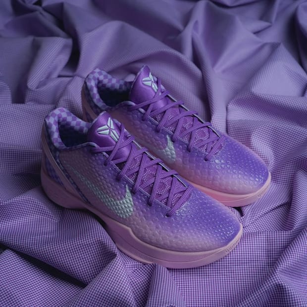 Purple Nike Kobe sneakers.