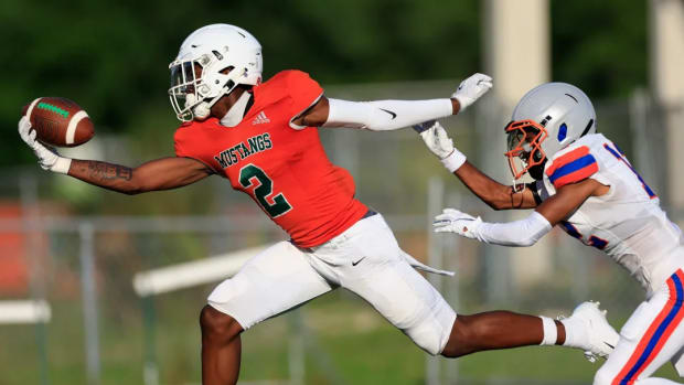 Mandarin wide receiver Jaime Ffrench makes a one-handed touchdown catch in a spring game against Bolles in May. 