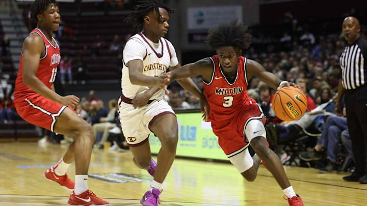 Josh Dixon creates space from the defender Judah Bontemps as Christ the King (NY) took on Milton (GA) in the first round of the Bass Pro Tournament of Champions on Thursday January 16th, 2025