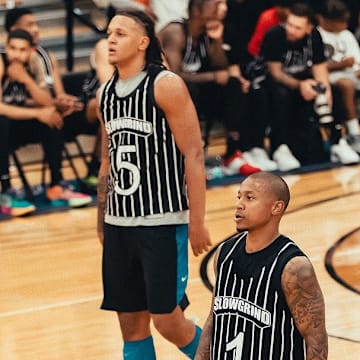 Orlando Magic forward Paolo Banchero (left) and Isaiah Thomas (right) during Thomas' annual "ZekeEnd" event earlier this summer.