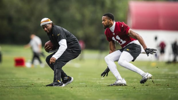 Washington Commanders assistant defensive backs coach William Gay (left) and safety Jeremy Chinn (right).